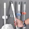 Държач за моп без пробиване, самозалепваща щипка за моп и метла - Broom ClipMop